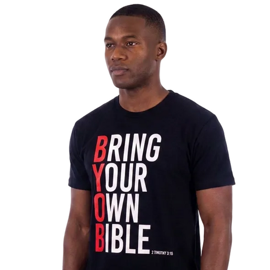 Man wearing a black t-shirt with 'BRING YOUR OWN BIBLE' text on a white background