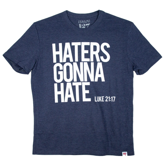 Navy Blue Shirt with the words Haters Gonna Hate across the chest. Referencing the verse Luke 21:17