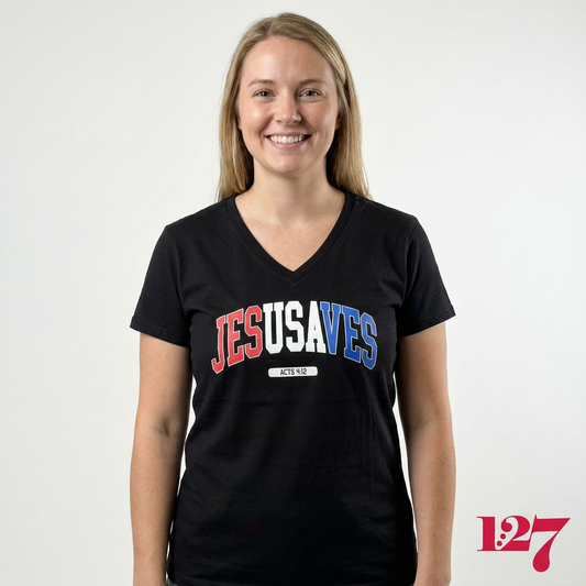 white woman wearing a black v-neck t-shirt that says "Jesusaves" across the front.