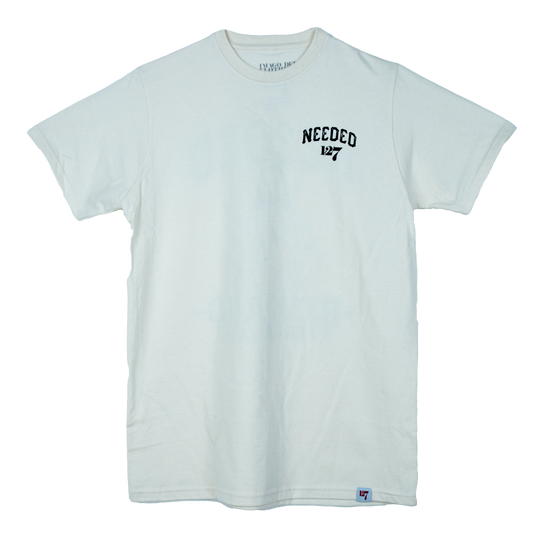 Cream colored shirt with front and back design that say Need on the left chest and across the back of the shirt is an image of Jesus as a wanted poster with the words Reward Everlasting life.