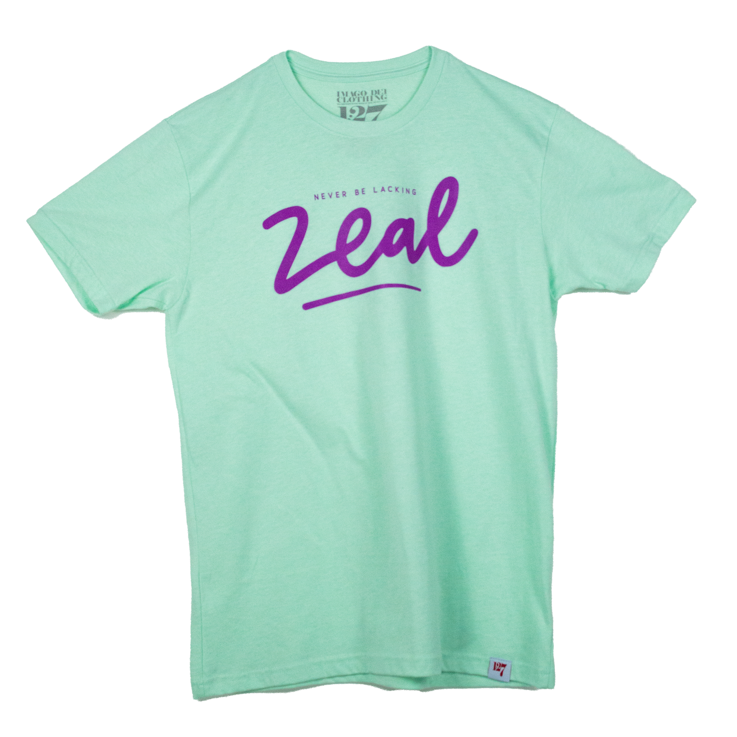 Lite Teal t-shirt that has the words, Never be Lacking Zeal across the chest of the Shirt.