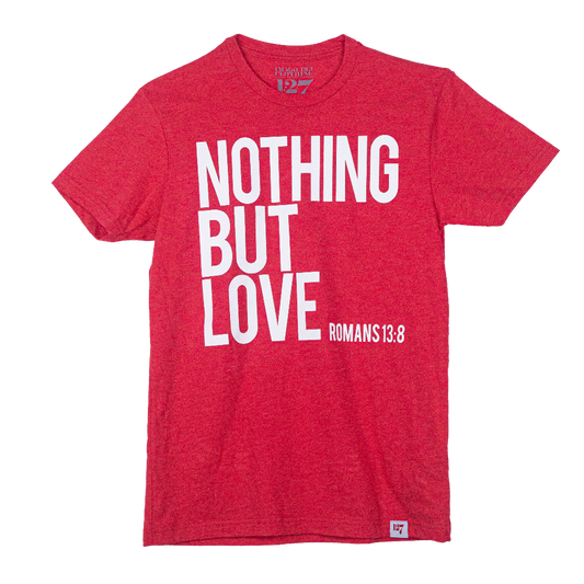 Red shirt with the words Nothing But Love on the front in white writing.