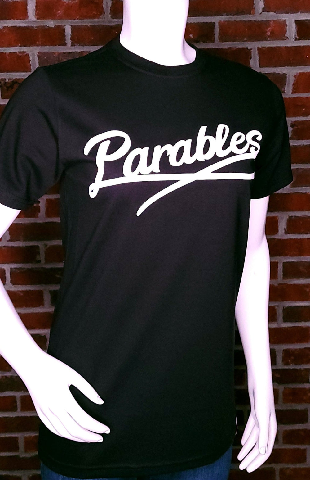 Black Shirt with the word Parables written in a script.