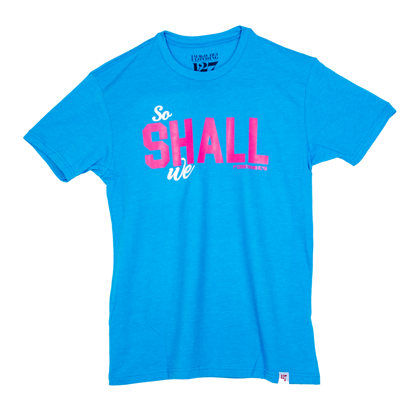Teal blue shirt with the words So shall we across the front. The verse mentioned with 1 Corinthians