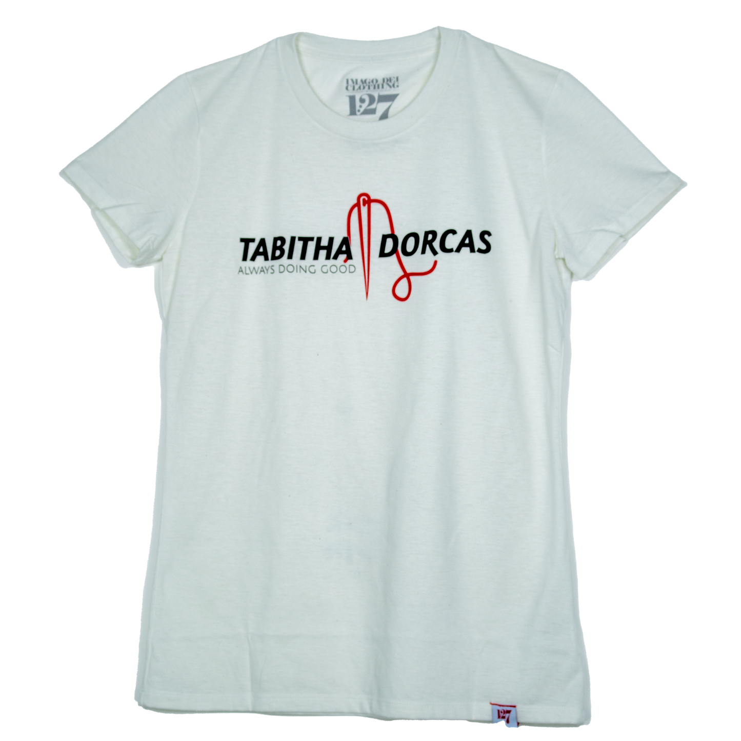 White shirt with black and red writing pointing to a bible figure named Tabitha Dorcas.