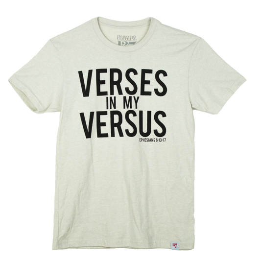 cream colored t-shirt with the words Verses in my versus in black.