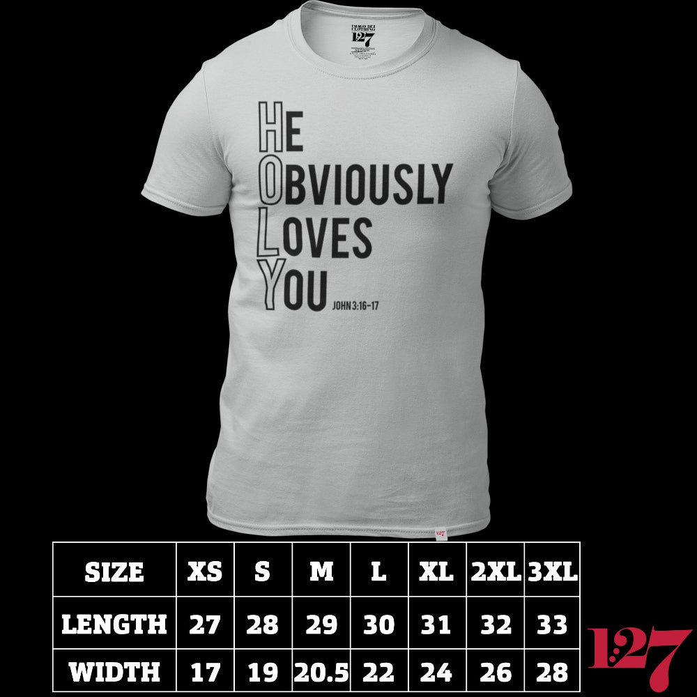 Beige t-shirt with the words He Obviously Loves You written downwards to show the word HOLY. The verse points to John 3:16-17