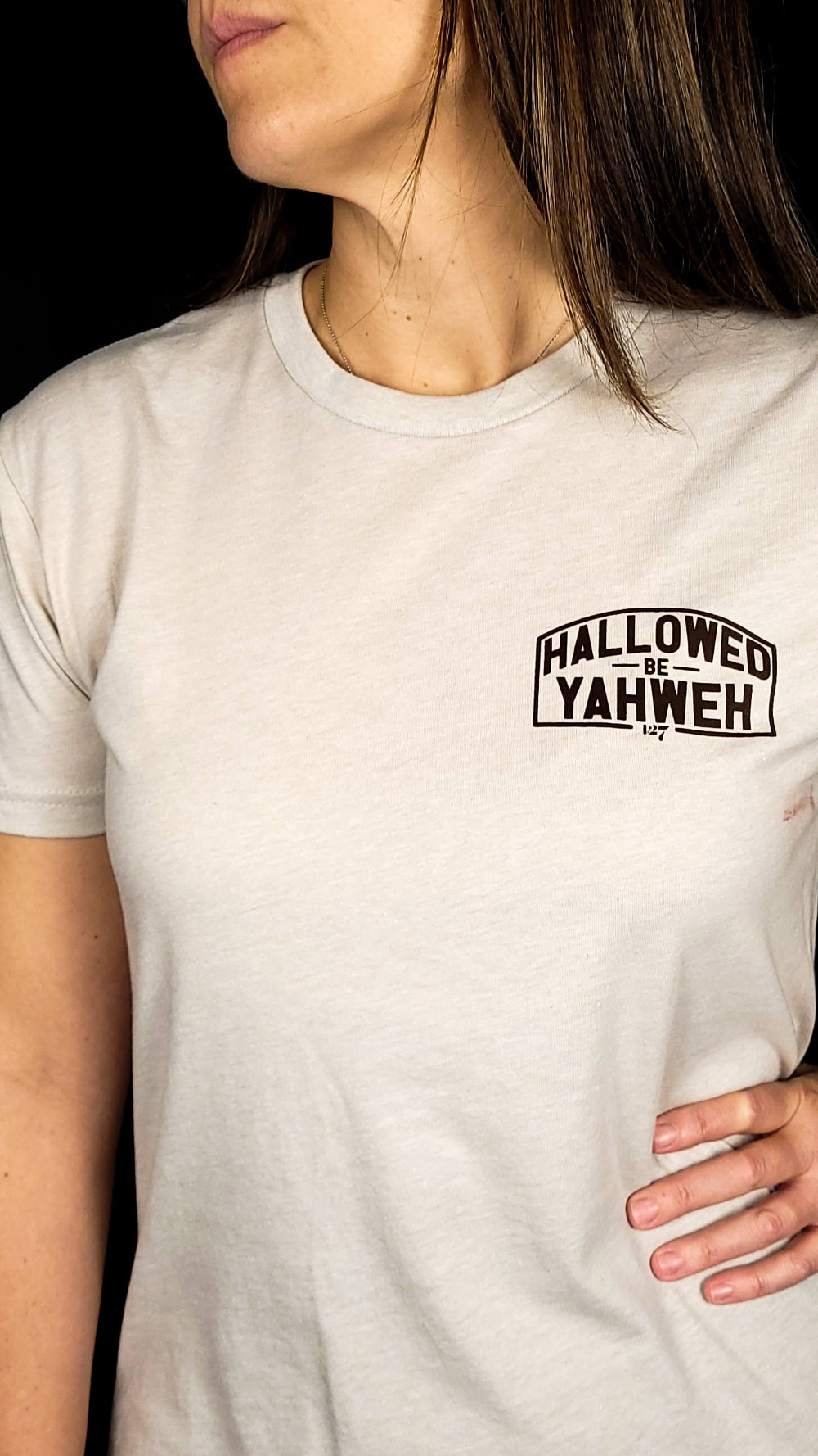 Sand Colored t-shirt with front design the says Hallowed Be Yahweh, full back design says Hallowed be Yahweh.