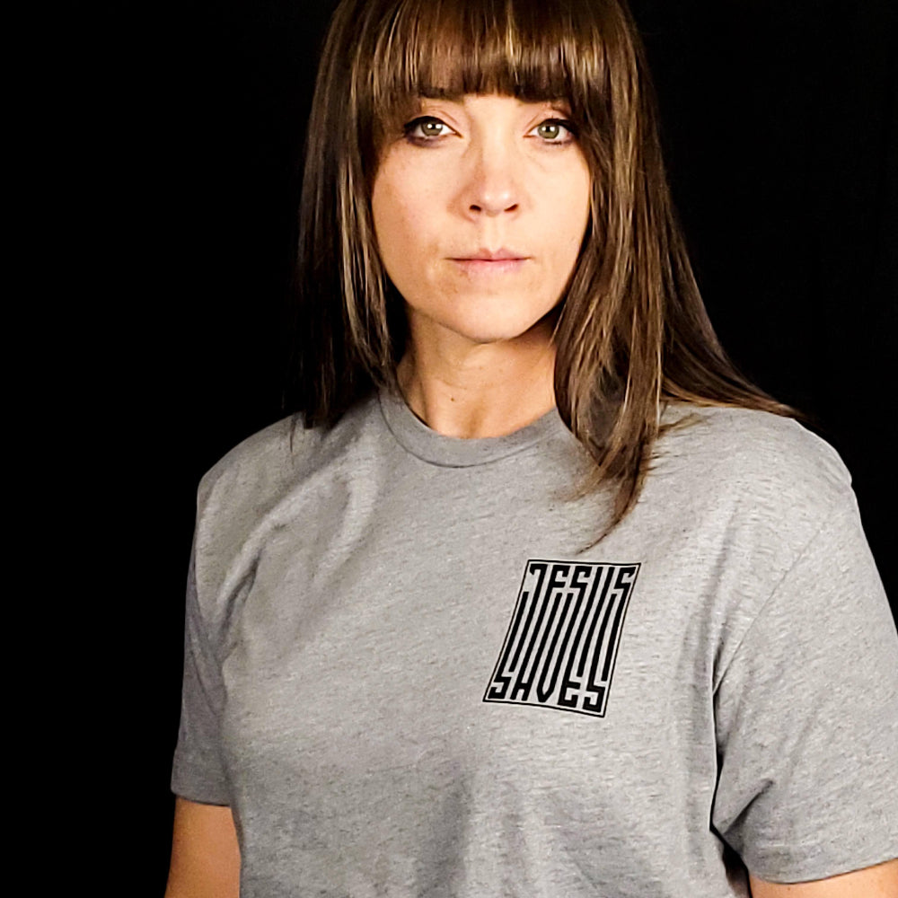 T-shirt with a barcode that says Jesus Saves on the left chest and fully down the back of the shirt.