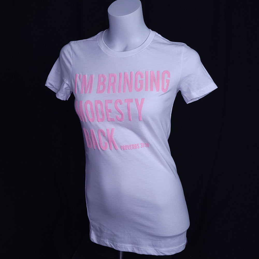 Women's t-shirt with the words I'm bringing Modesty back across the front.