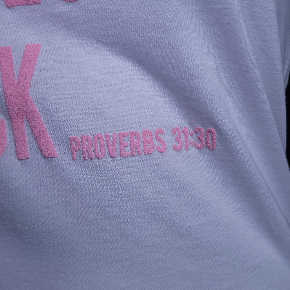 Women's t-shirt with the words I'm bringing Modesty back across the front.