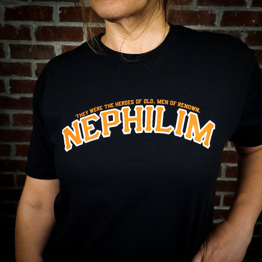 Black Shirt with the Word Nephilim written across the chest with orange ink. Inspired by the San Fransisco Giants logo.