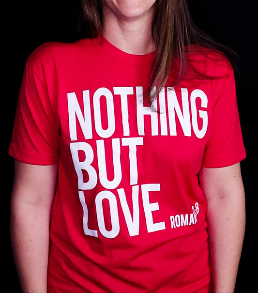 Red shirt with the words Nothing But Love on the front in white writing.