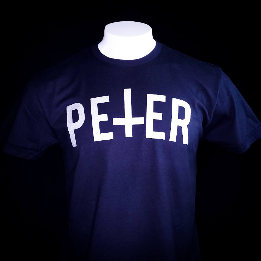 Black Shirt with a Petrine Cross on the front in the name of Saint Peter.
