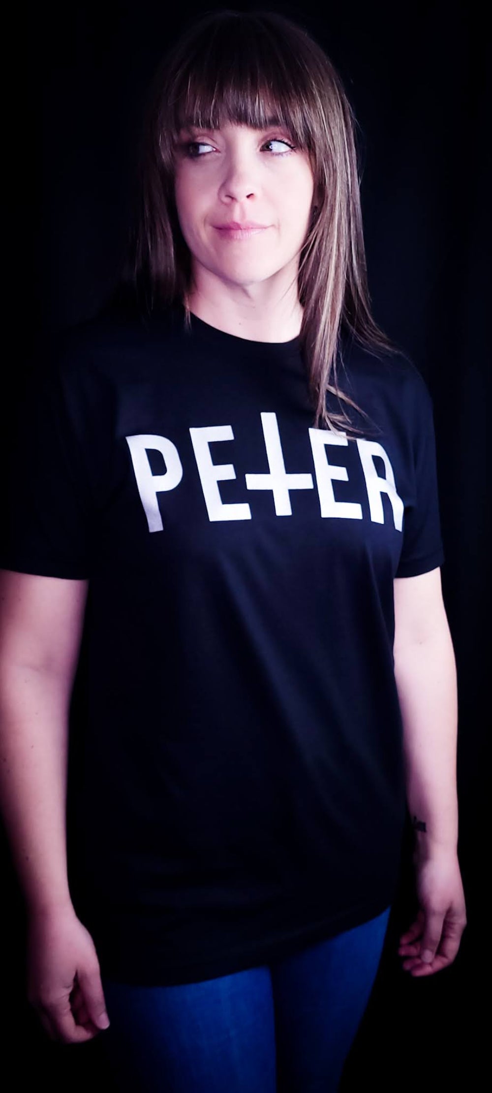 Black Shirt with a Petrine Cross on the front in the name of Saint Peter.