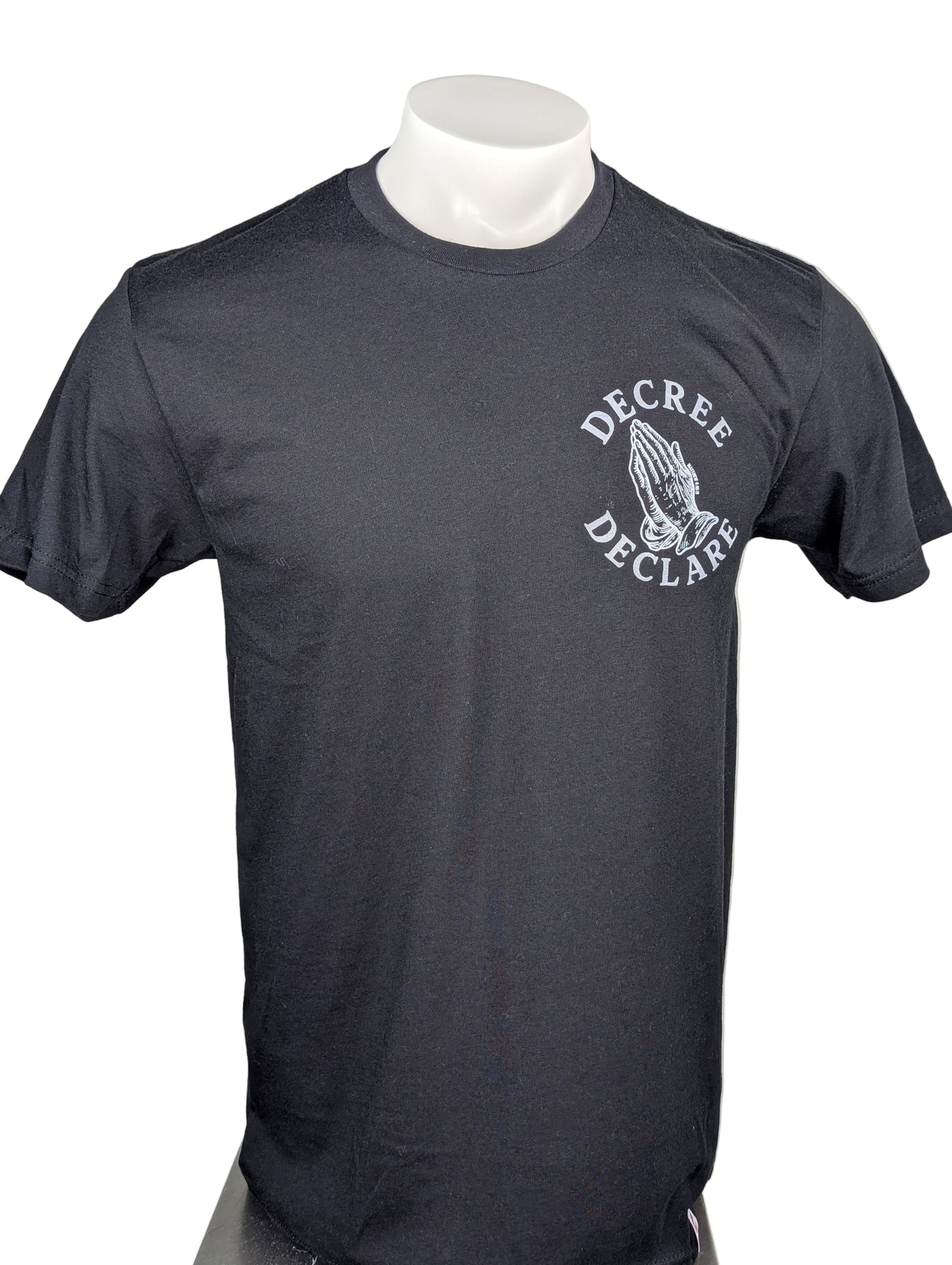 Black t-shirt with white logo on a mannequin against a white background