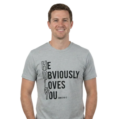 Man wearing a gray t-shirt with text on a white background