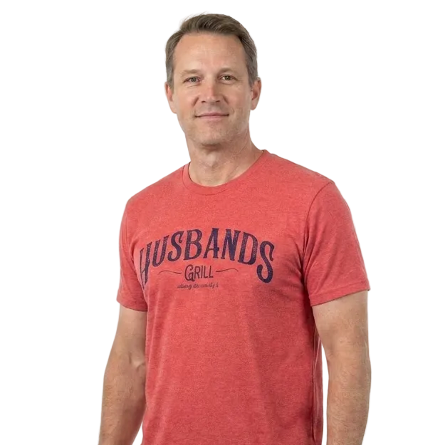 Man wearing a red t-shirt with 'HUSBANDS GRILL' text on a white background