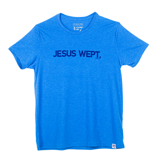 Light blue t-shirt with the words Jesus Wept across the chest. Verse is referencing John 11:35.