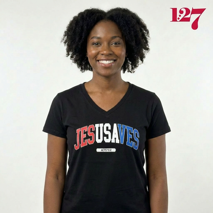 African American woman wearing a black v-neck t-shirt with the words "Jesusaves" across the front. 