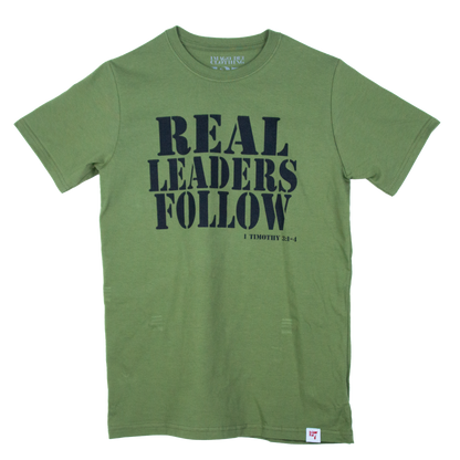 Military Green shirt with the words Real Leaders Follow. Verse is referencing 1 Timothy 3:1-4.