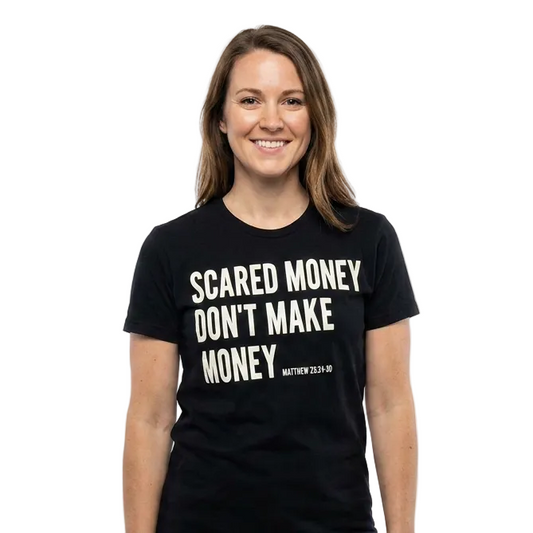 Woman wearing a black t-shirt with text on a white background
