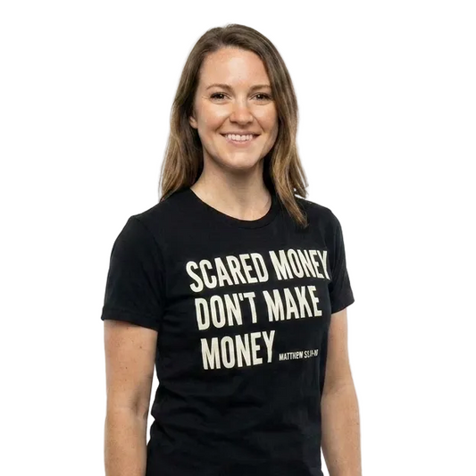 Woman wearing a black t-shirt with text on a white background