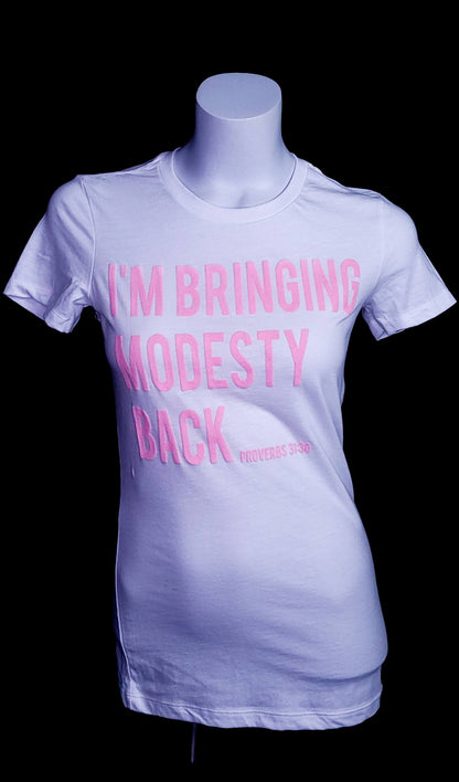 Women's t-shirt with the words I'm bringing Modesty back across the front.