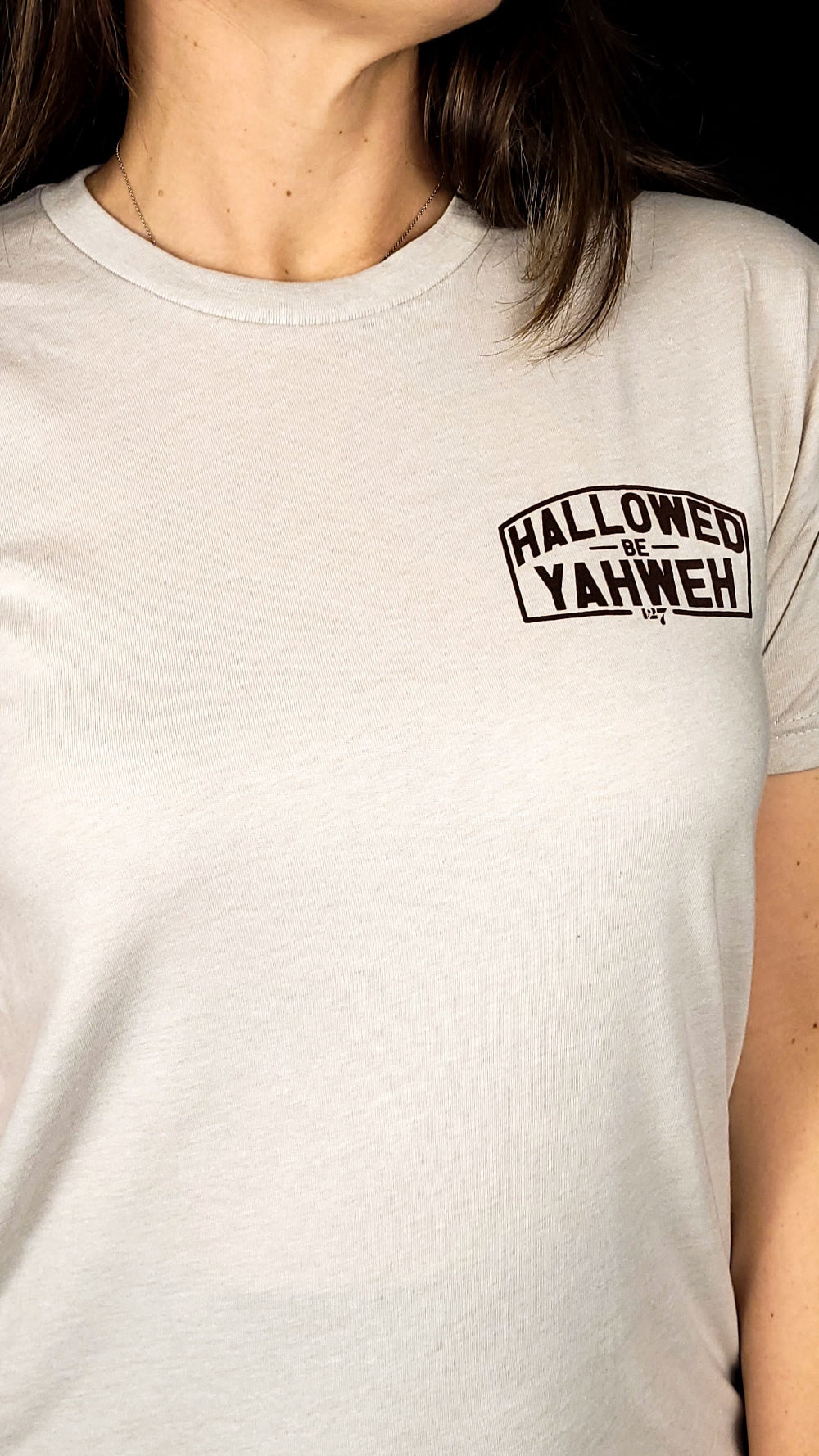 Sand Colored t-shirt with front design the says Hallowed Be Yahweh, full back design says Hallowed be Yahweh.