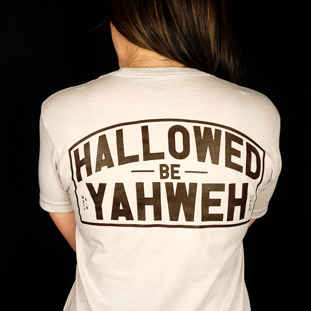 Sand Colored t-shirt with front design the says Hallowed Be Yahweh, full back design says Hallowed be Yahweh.