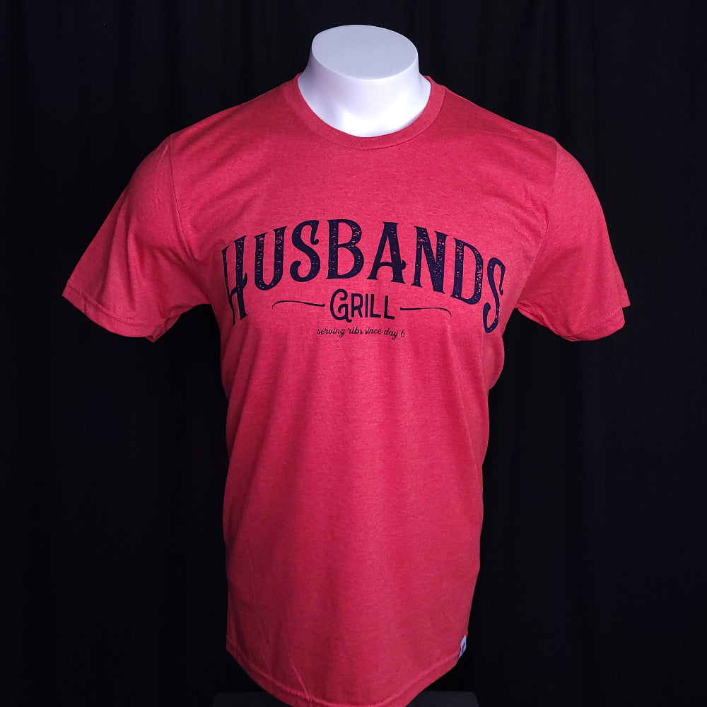 Red shirt that reads Husbands Grill across the chest. 