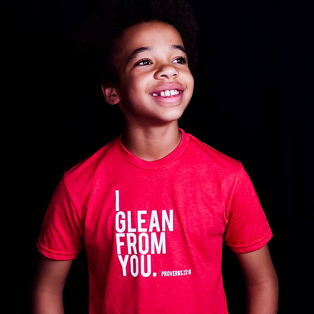 I glean from you. Young man wearing red shirt. 