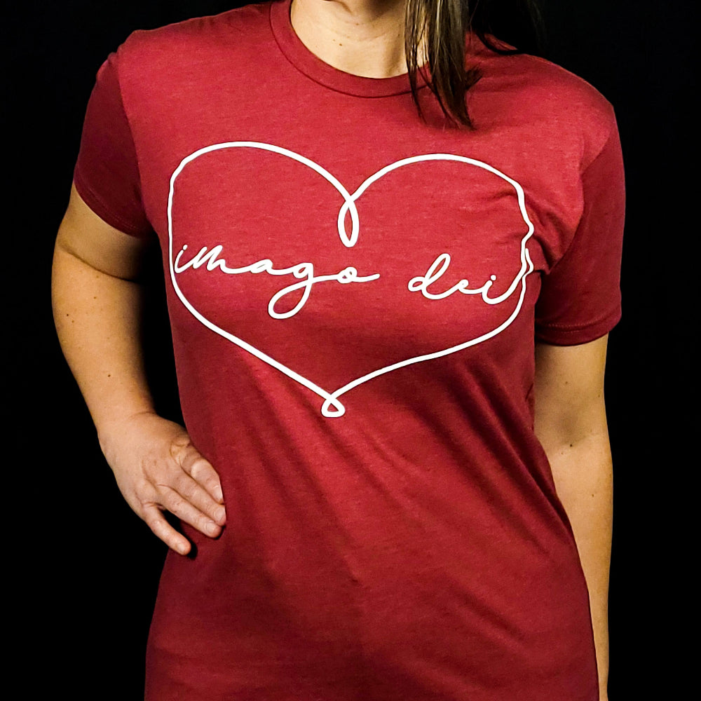 Crimson Red Shirt with a heart that spells out Imago Dei. 