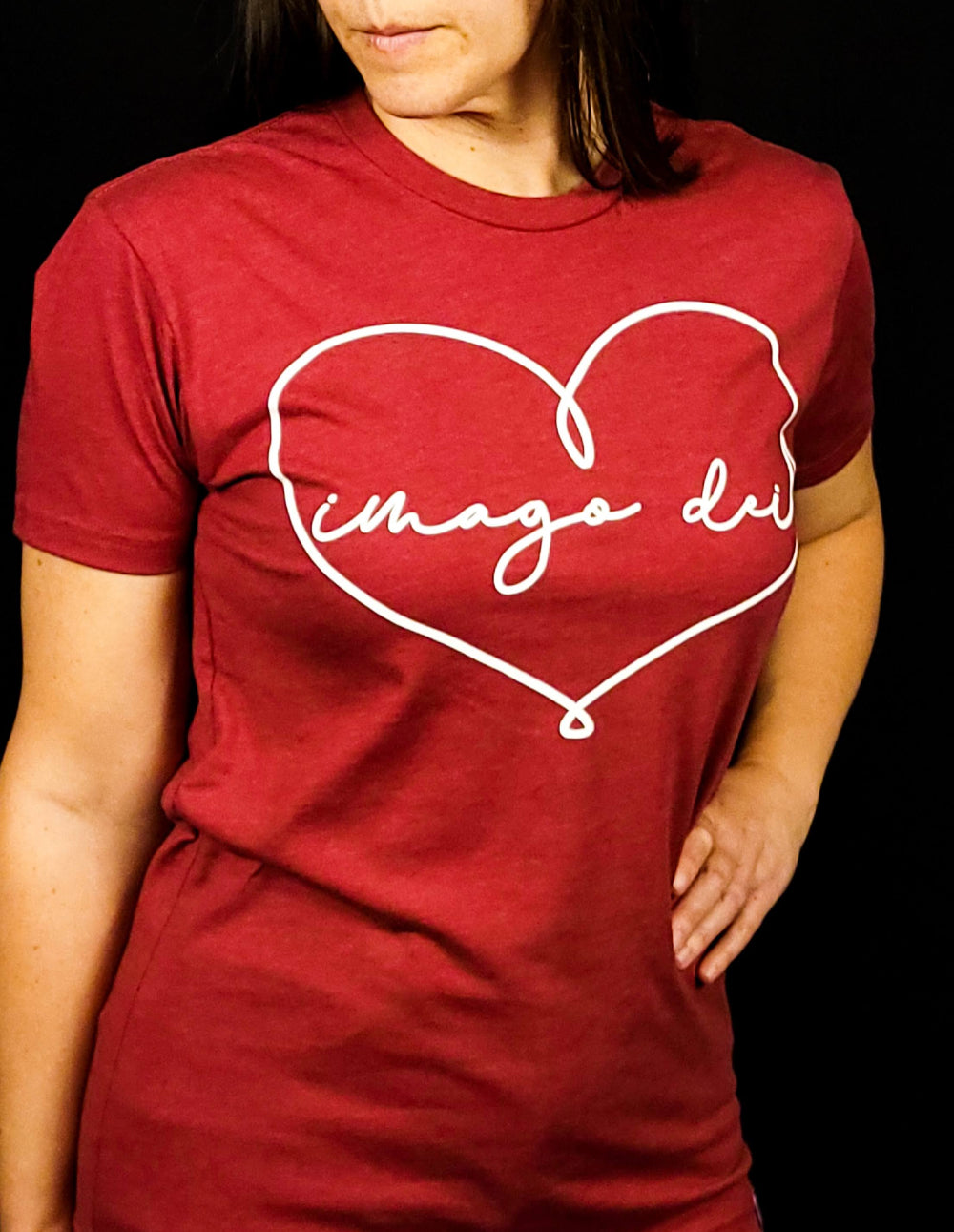 Crimson Red Shirt with a heart that spells out Imago Dei. 