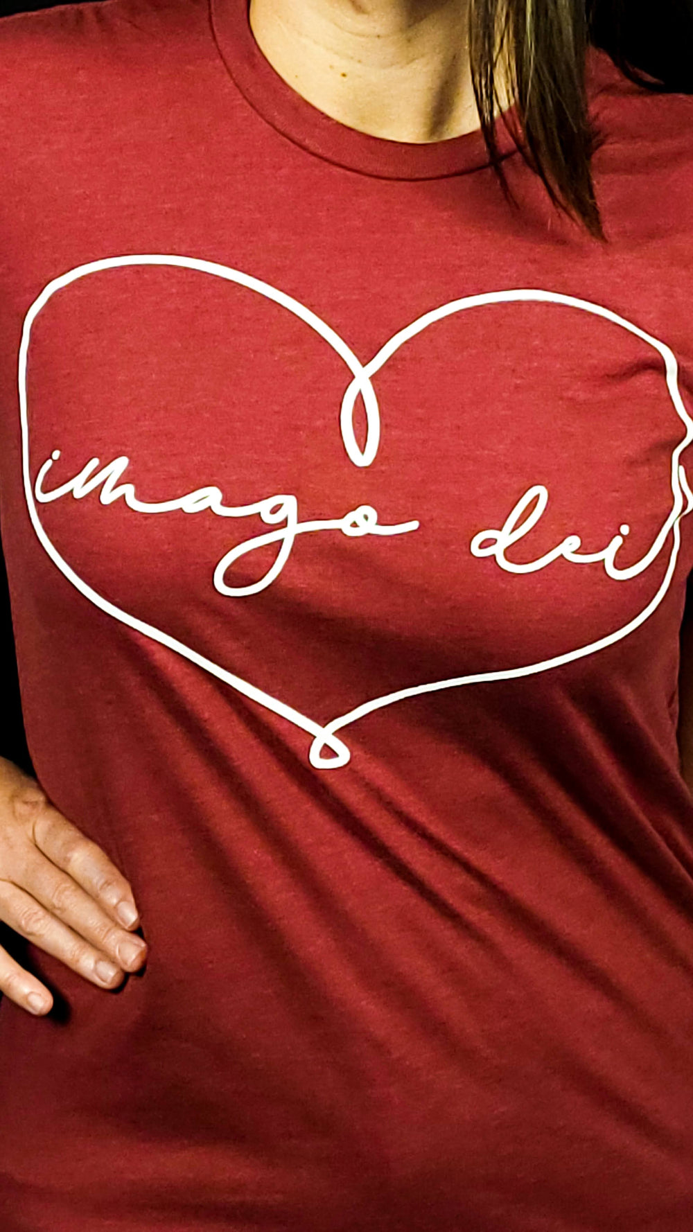 Crimson Red Shirt with a heart that spells out Imago Dei. 