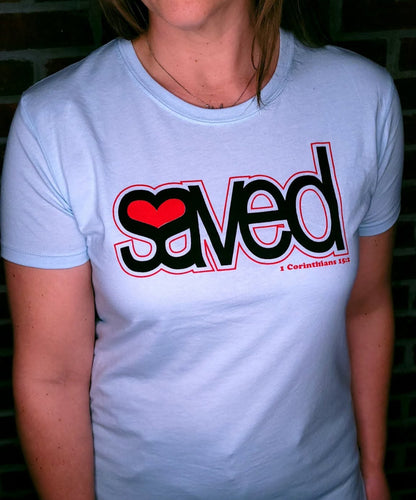 Light Blue t-shirt with the word Saved written along with a heart in the void of SA.