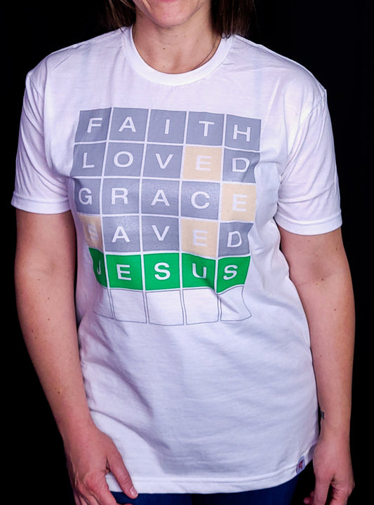 White T-shirt with the words Faith, Loved, Grace, Saved, and Jesus in a format of the game Wordle.