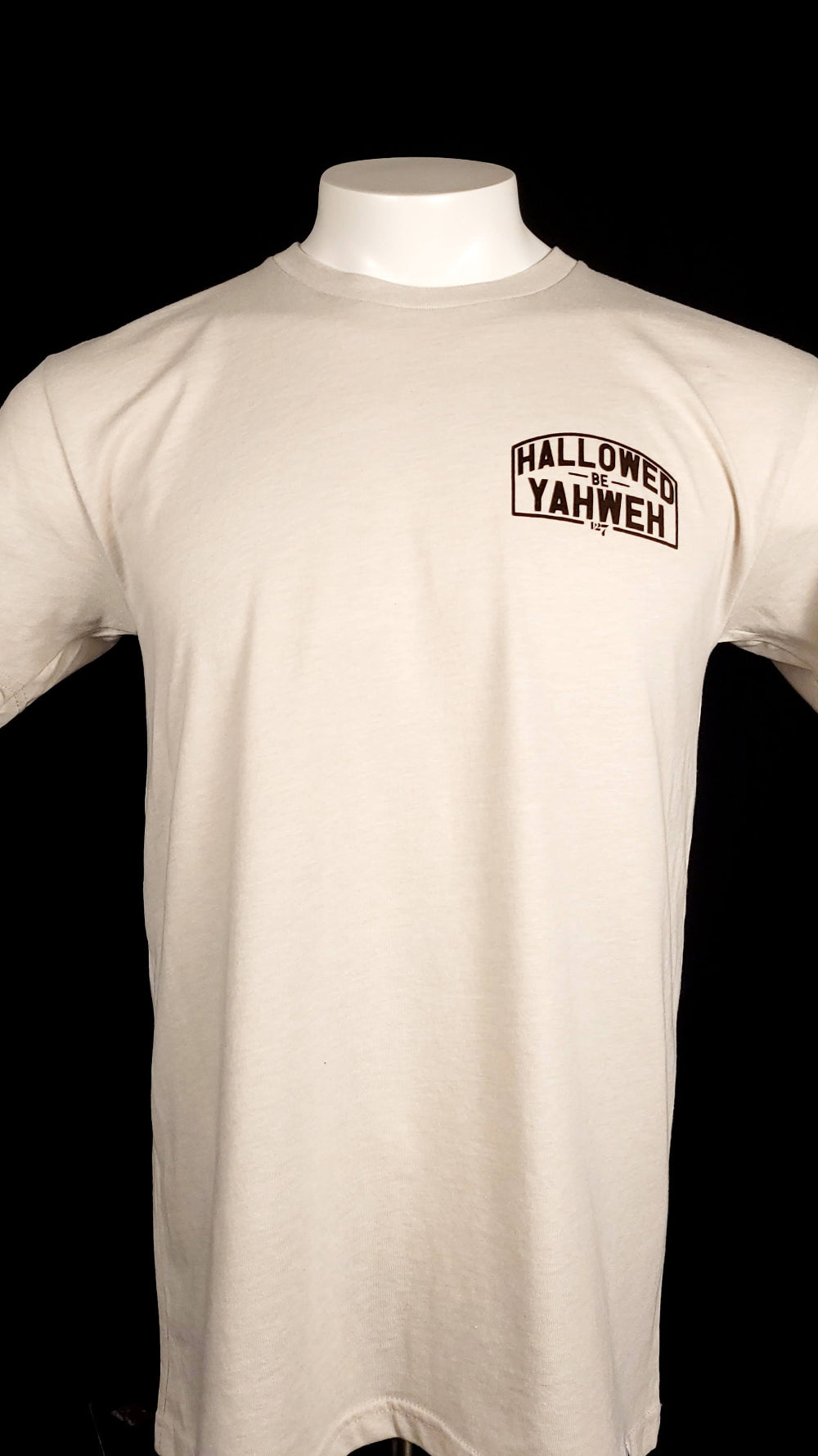 Sand Colored t-shirt with front design the says Hallowed Be Yahweh, full back design says Hallowed be Yahweh.